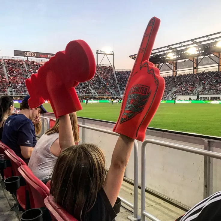 DC United Game fan with foam fingers