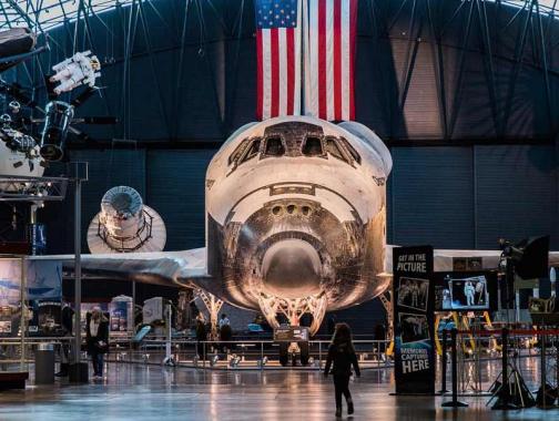 @abroadwife - Child standing in front of Space Shuttle Discovery at the Udvar-Hazy Air and Space Museum - Free Smithsonian museum near Washington, DC