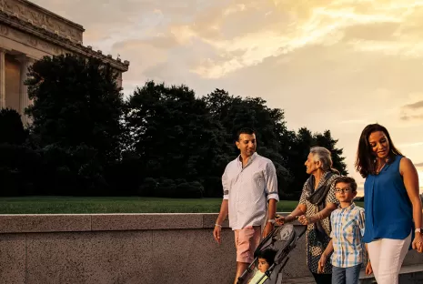 Family strolling by Lincoln Memorial